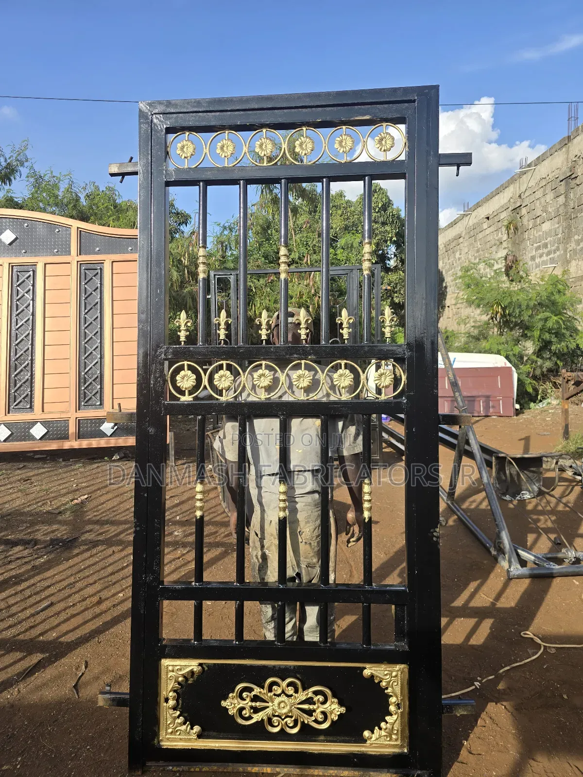 Stylish Black Gold Gate With Side Door
