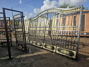 Stylish Black Gold Gate With Side Door
