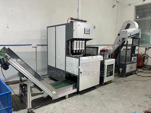 4 Cavity Pet Bottle Blowing Machine – 2000bph | Preform To Bottle - main view