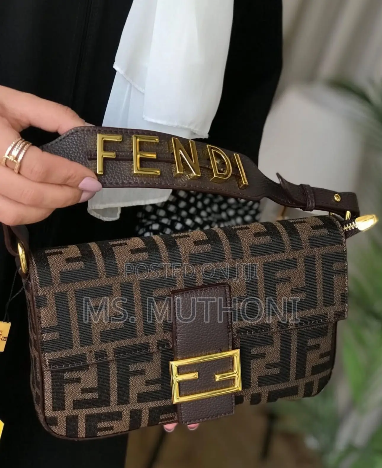 Fendi Medium Baguette Bag With Gold Hardware.