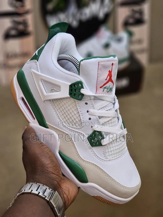 Nike Air Jordan 4 "First Class" Sneakers In White And Mint Green.