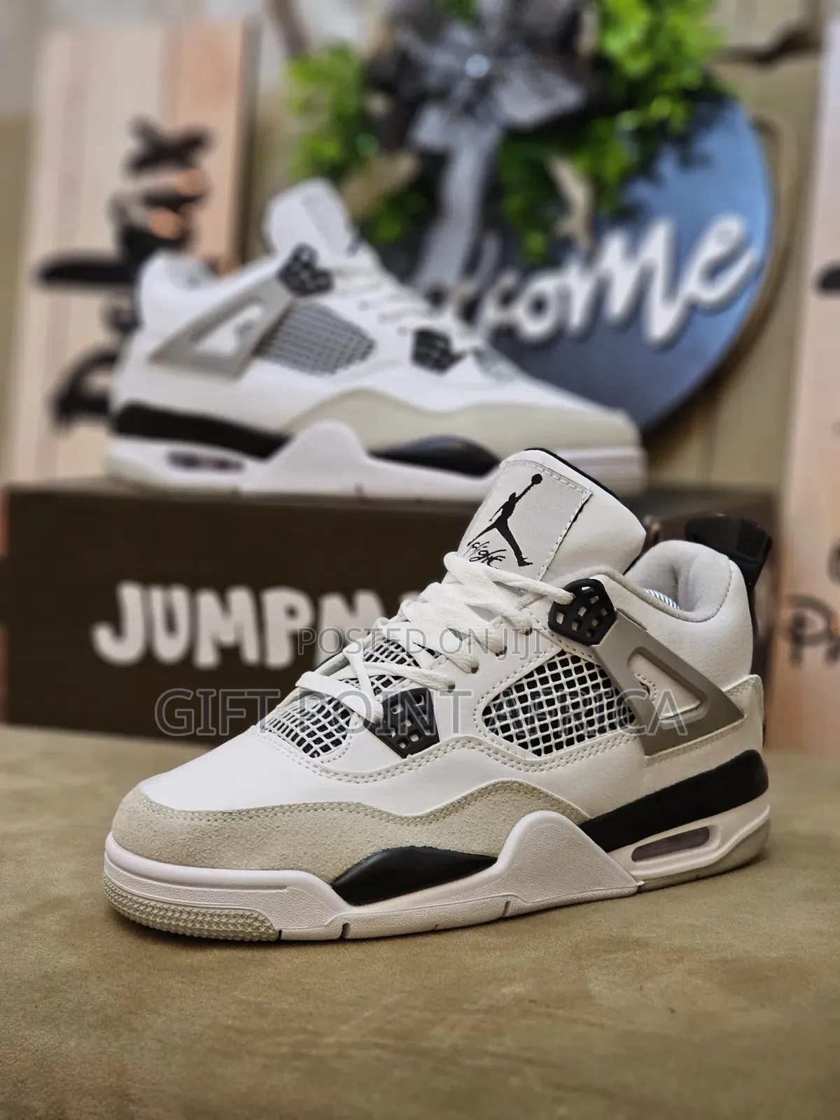 Jordan Air Jordan 4 Retro "Military Black" Sneakers.