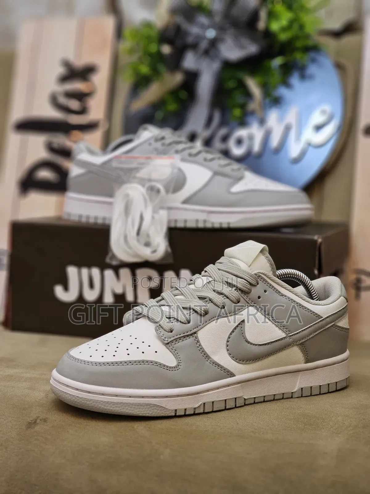 Nike Dunk Low Retro Sneaker In The "Grey Fog" Colorway.