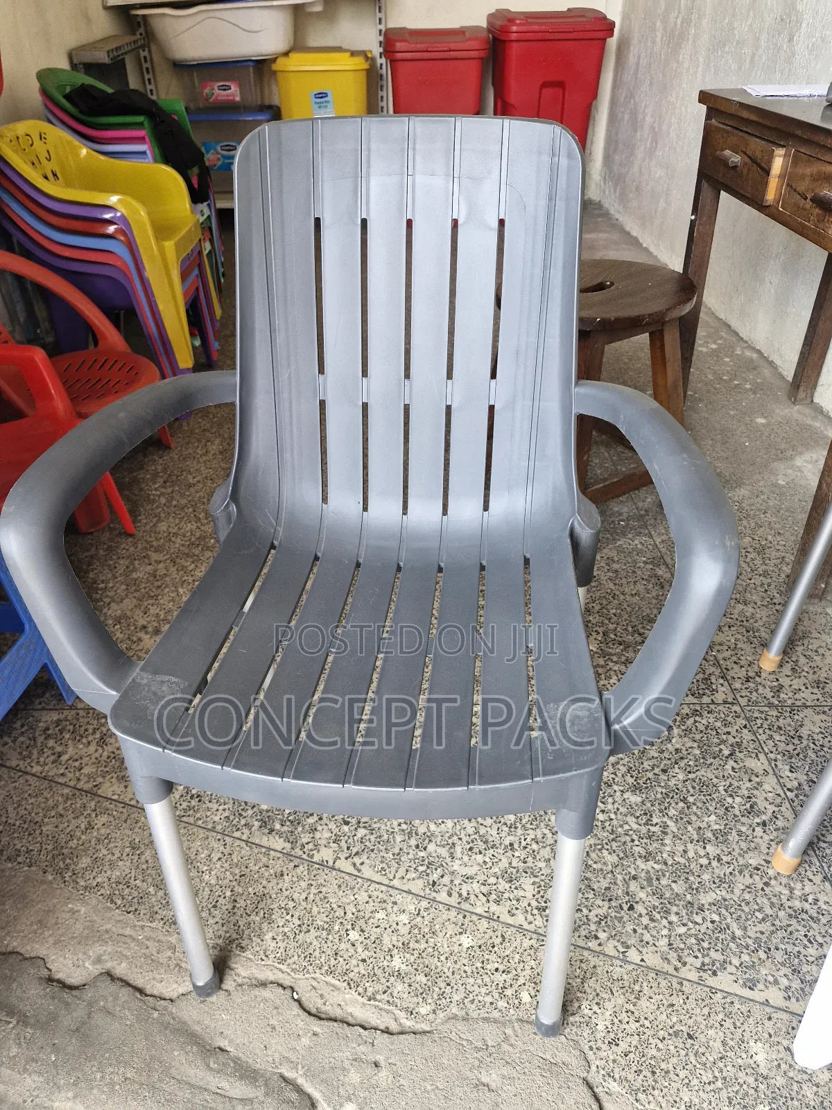 Dark Modern Metal Tubing Arm Chair