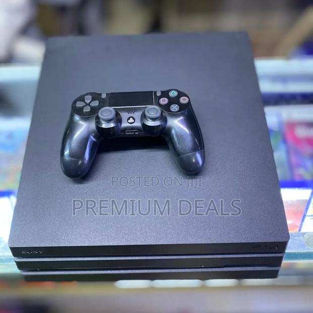Realistic Ps4 Pro With 16games and All Cables.