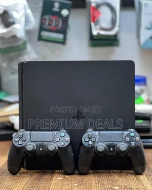 500gb Ps4 Slim With 10games Two Controllers.