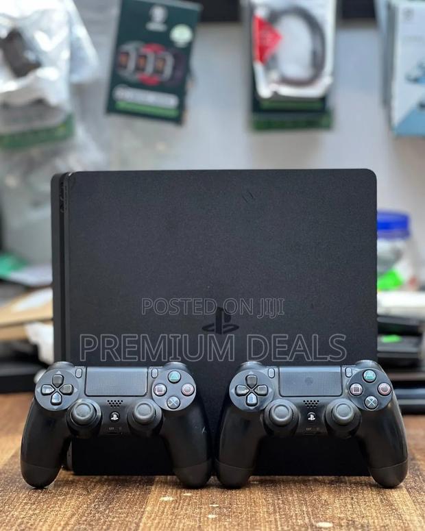 500gb Ps4 Slim With 10games Two Controllers.