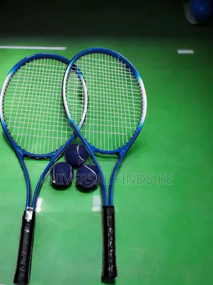 The Ultimate Tennis Racket With Green Balls