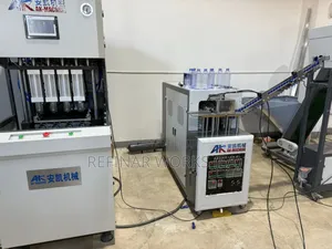 Energy-efficient 4 Cavity Pet Bottle Blow Moulding Machine