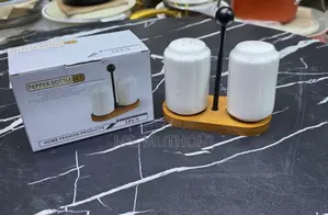 Ceramic Salt and Pepper Shaker Set With a Wooden Caddy