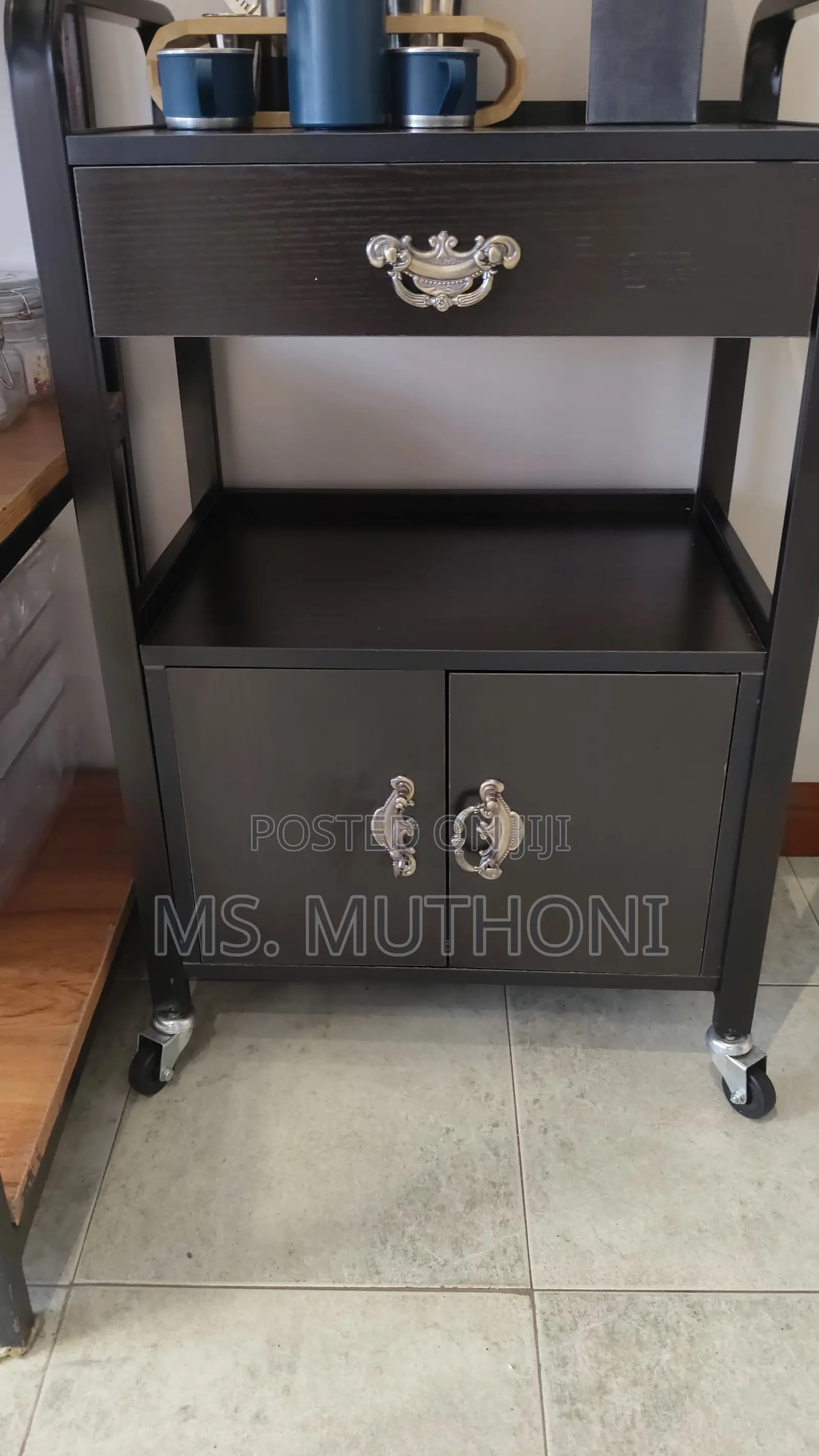 Two Tier Unit With a Drawer a Lower Cabinet Mobile Multipurpose Car