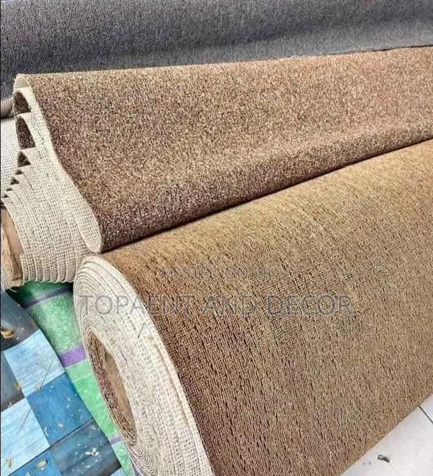 Rolls of Beige Wall to Wall Carpet - main view