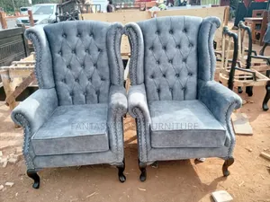 Tufted Wingback Armchairs
