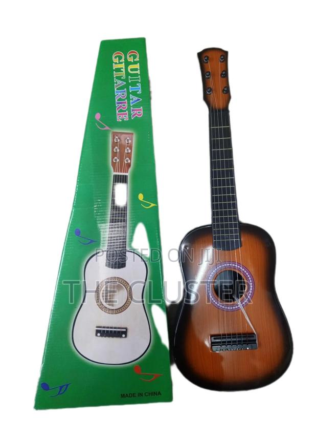 Musical Guitar
6 Strings
Size 23 Inch
