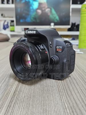 Canon Eos Rebel T5i DSLR Camera + 50mm STM 1.8 - main view