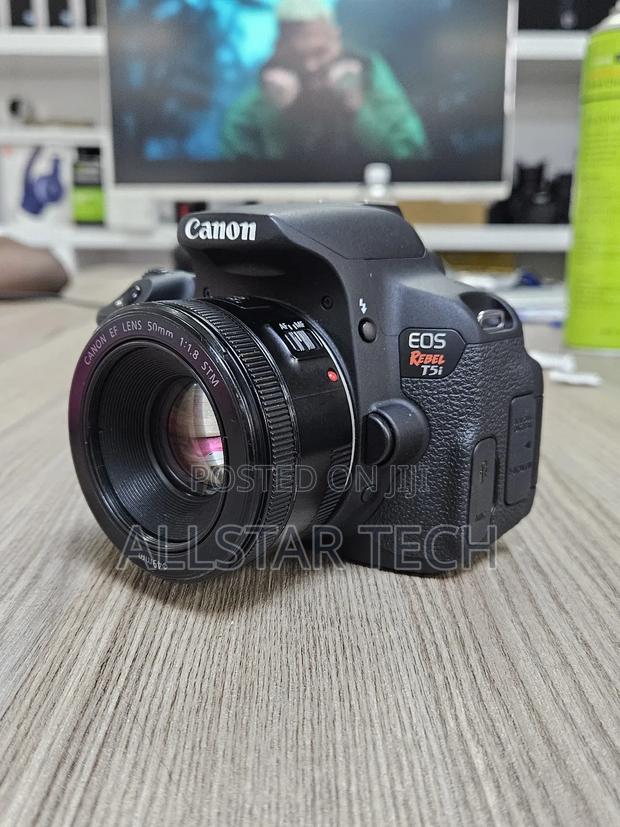 Canon Eos Rebel T5i DSLR Camera + 50mm STM 1.8