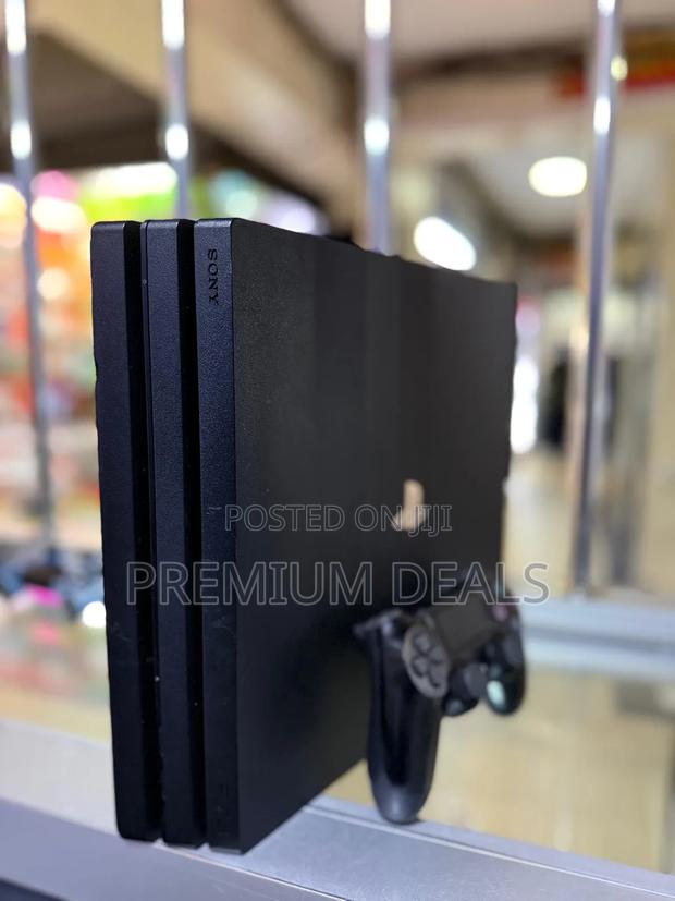 Ps4 Pro With Kids Games 1tb and Original Controller.