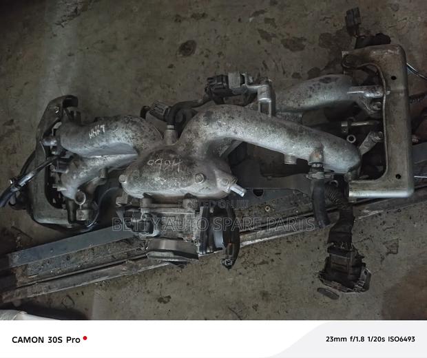 Subaru El 15 Engine Manifold