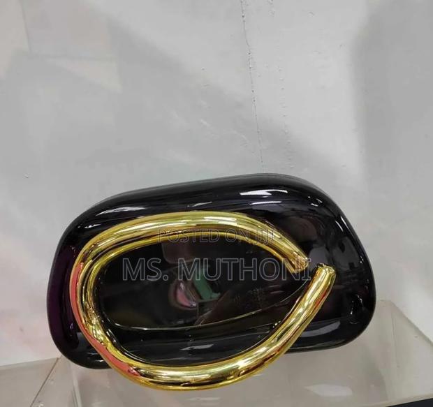Minimalist Clutch Bag With a Golden Handle - thumbnail 6