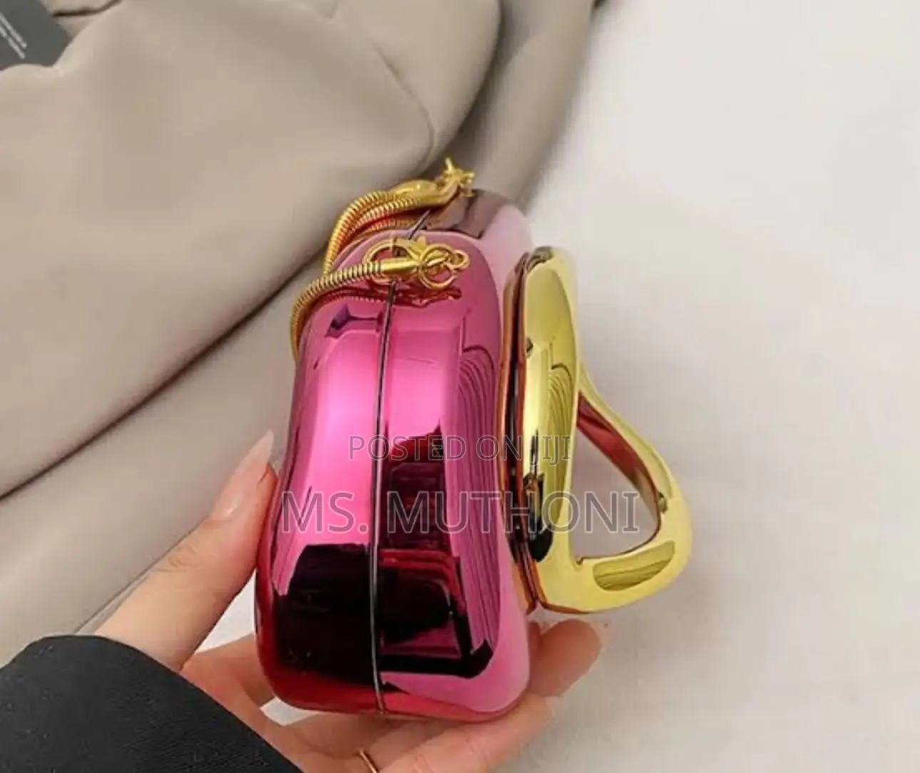 Minimalist Clutch Bag With a Golden Handle