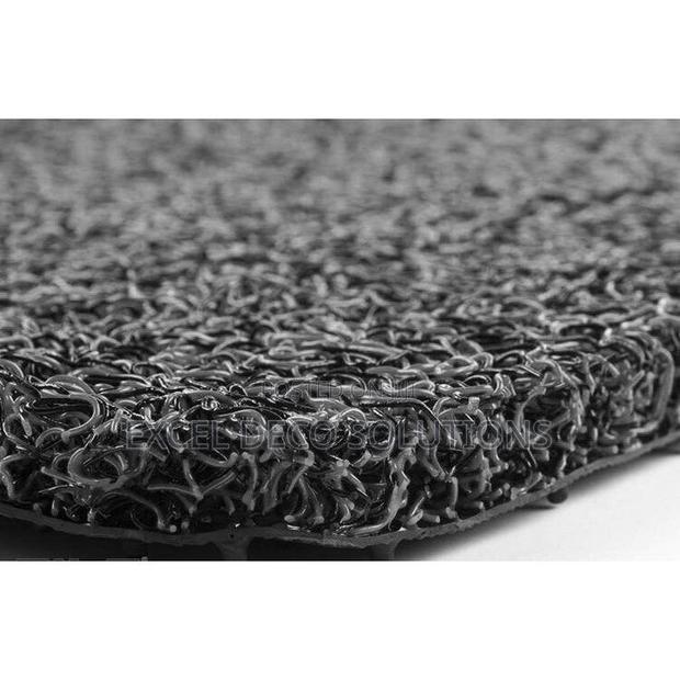 Rain or Shine, Drive Fine — All-Weather PVC Coil Mats!