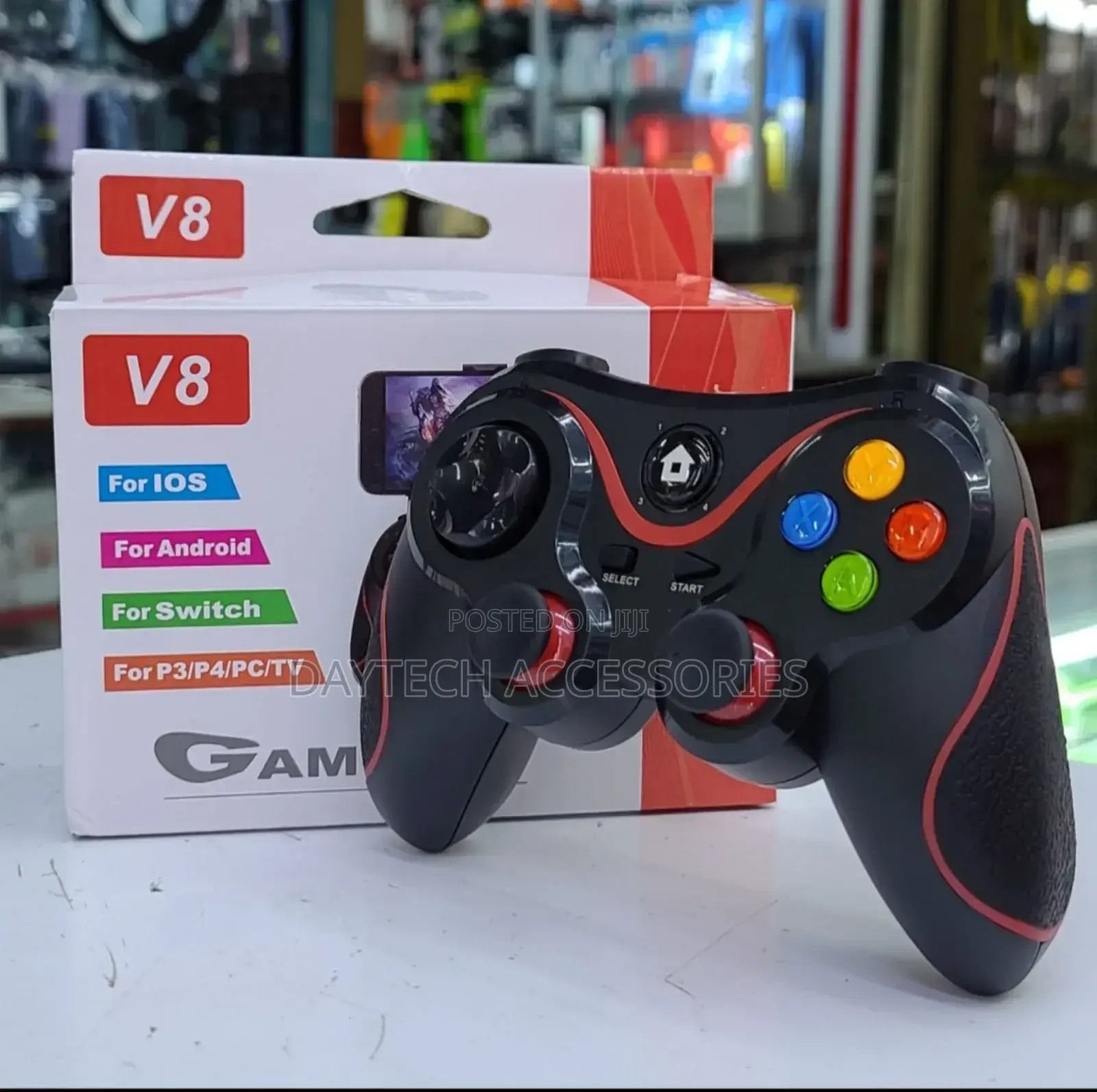 V8 Wireless Bluetooth Mobile Game Controller With Smartphone Holder.