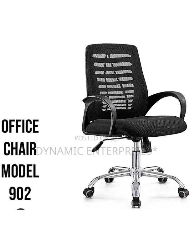Black Mesh Office Chair With a Chrome Base and Armrests - main view