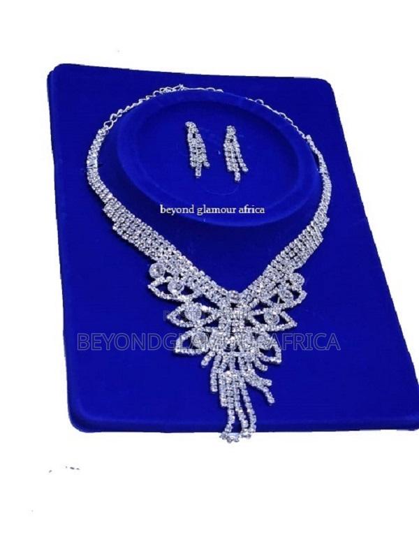 Ladies Silver and Golden Crystal Set Fashionable and Durable.