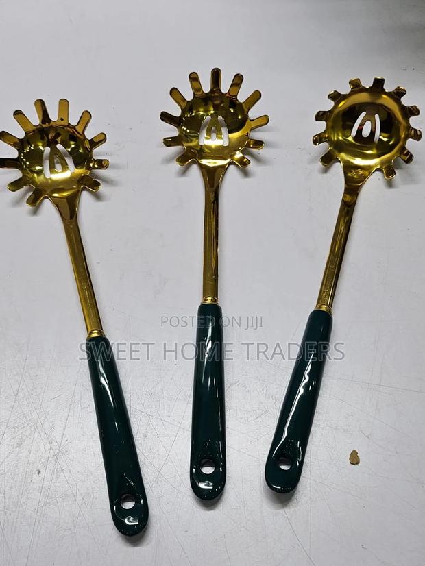 Golden Pasta Spoon With Ceramic Handle - main view