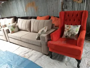 Beige 3-Seater With Soft Cushions and Floral Pillows.