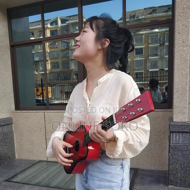 Kids Beginners 23" Acoustic 6 Stringed Acoustic Ukelele Guitar - thumbnail 3