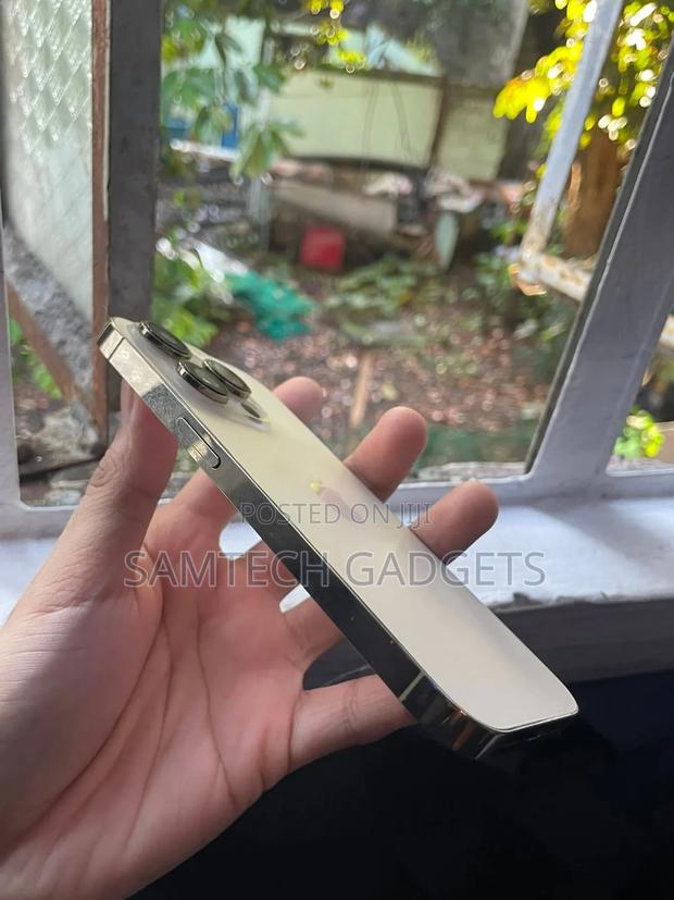 Apple iPhone 14 Pro 128 GB Gold - thumbnail 4