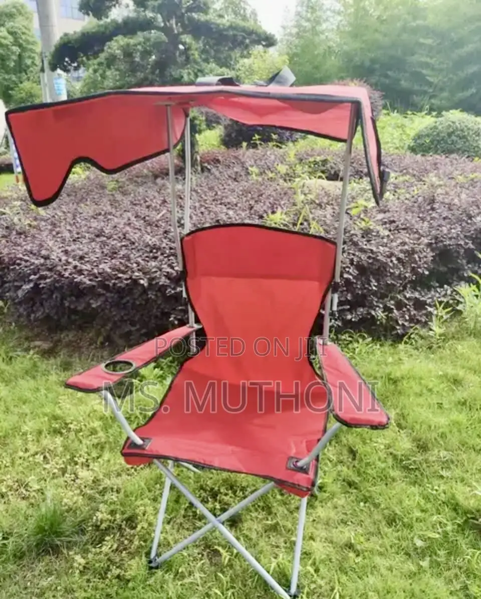 Portable Folding Camping Chair With an Integrated Sun Canopy.