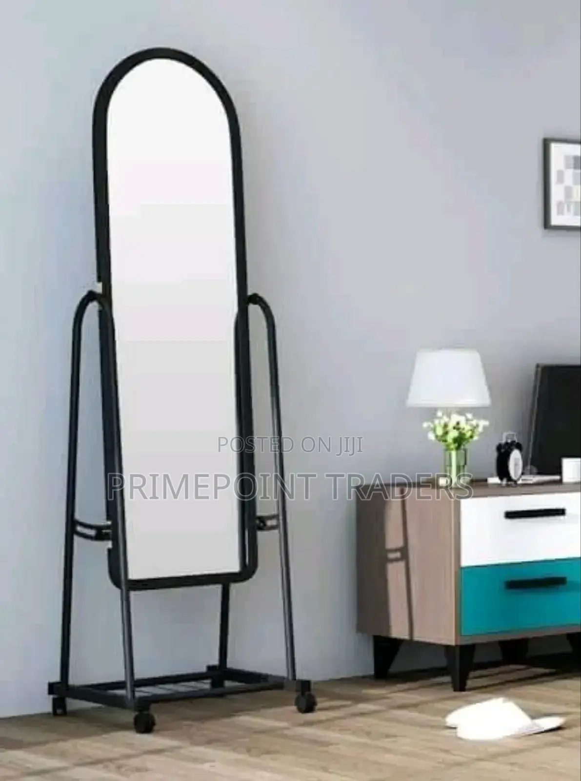 3. “Sleek Black Standing Mirror With Wheels Multi-Level Shoe Rack”