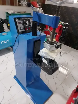 Vulcanising Machine.