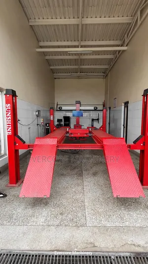 Sunshine Italy Fpir Post Carlift With Wheel Alignment Machine Set Up.