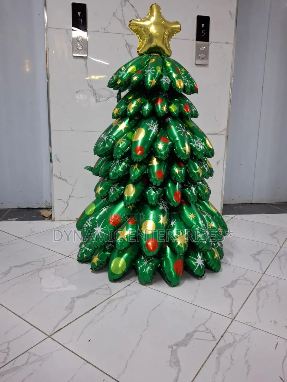 Christmas Tree Made Entirely of Green Foil Balloons