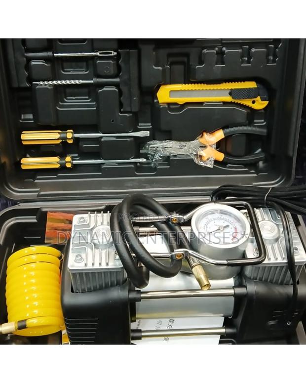 Car Air Compressor With a Tool Kit