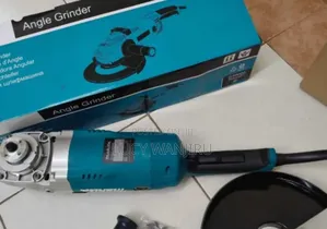 Brand New Makita Grinder 9inch 
With Guard and Handle