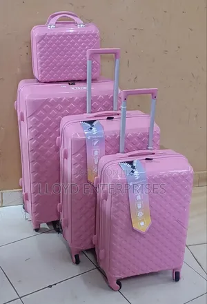 Unbreakable Pink and Chocolate Suitcases 4pcs