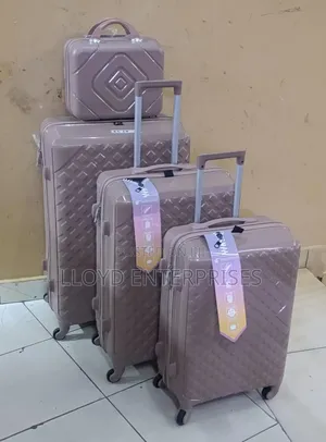 Unbreakable Pink and Chocolate Suitcases 4pcs