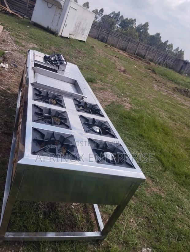 Combined Cooker 6 Burner With Griddle and Deep Fryer. - main view