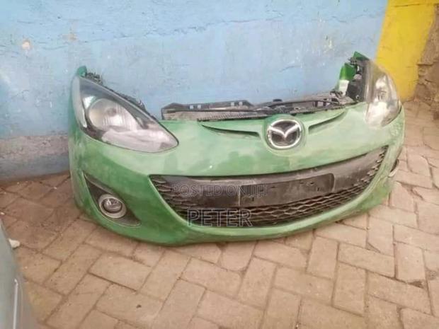 Mazda Demio Nosecut Year 2012 - main view