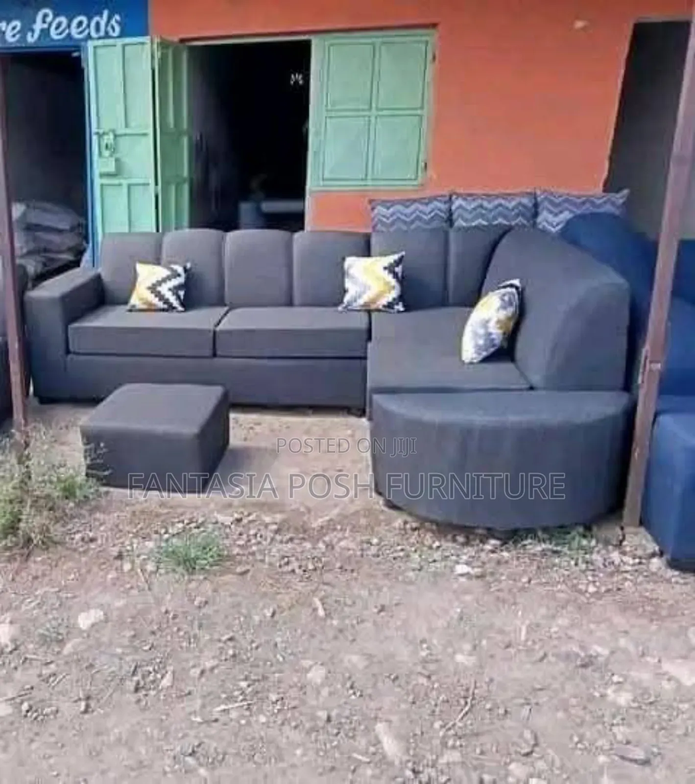 Dark Grey L-Shaped Sofa With Round Chaise and Ottoman