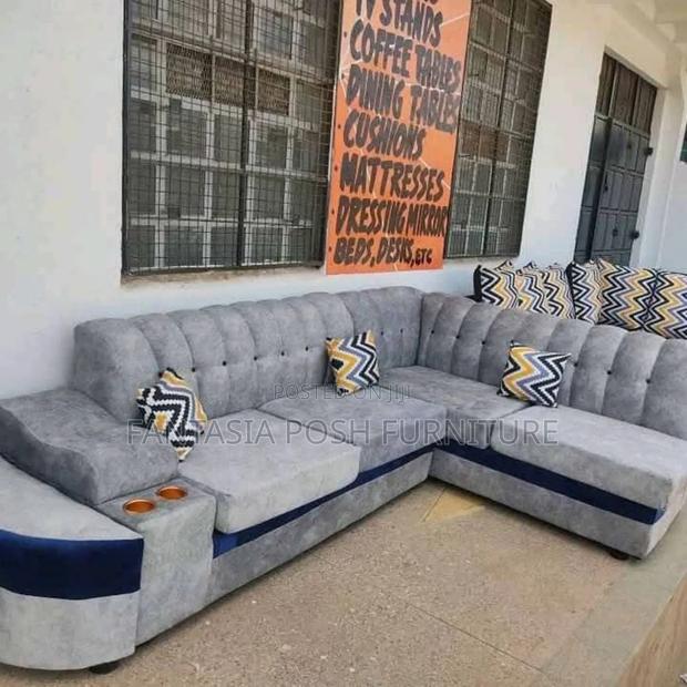 Grey L-Shaped Sofa With Cup Holders