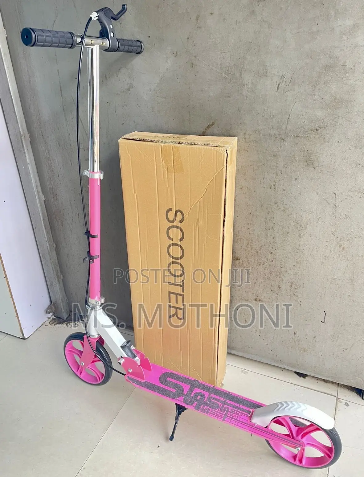 Pink Two-Wheeled Metalic Kick Scooter With Hand Brakes