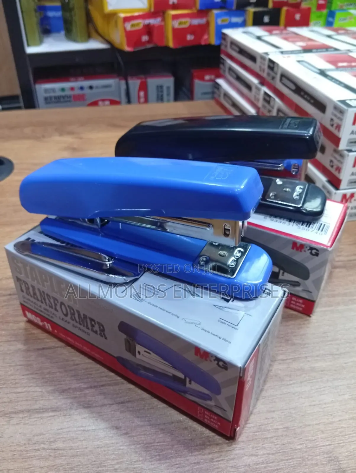 A Piece of Metallic M G Stapler With Staple Remover Leaf