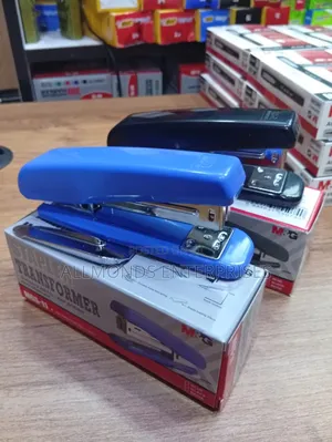 A Piece of Metallic M G Stapler With Staple Remover Leaf