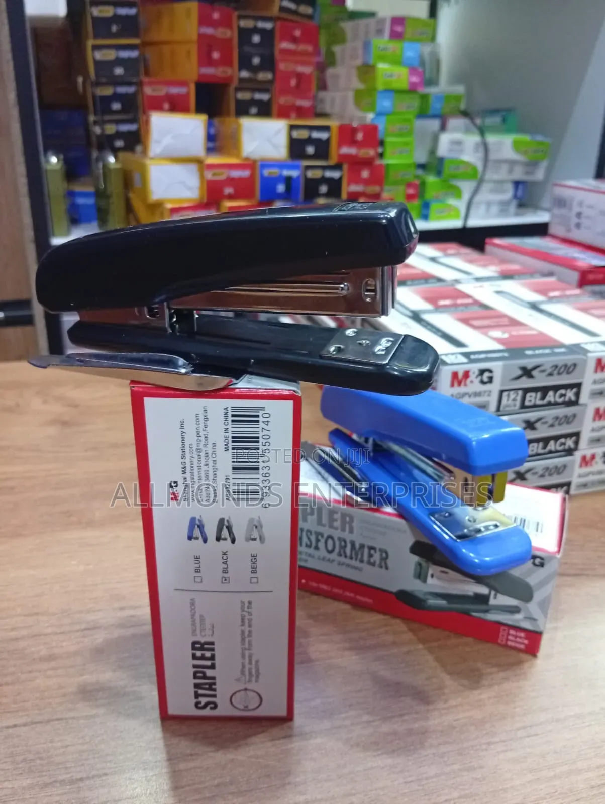 A Piece of Metallic M G Stapler With Staple Remover Leaf