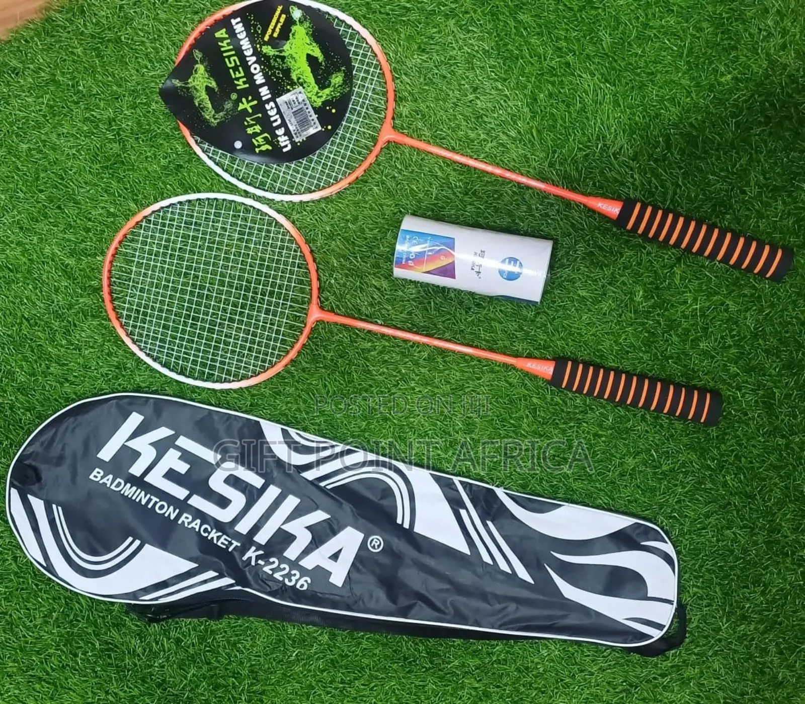 A Pair Of Badminton Rackets With Shuttle S And A Bag Carrier